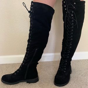 Thigh high lace up boots